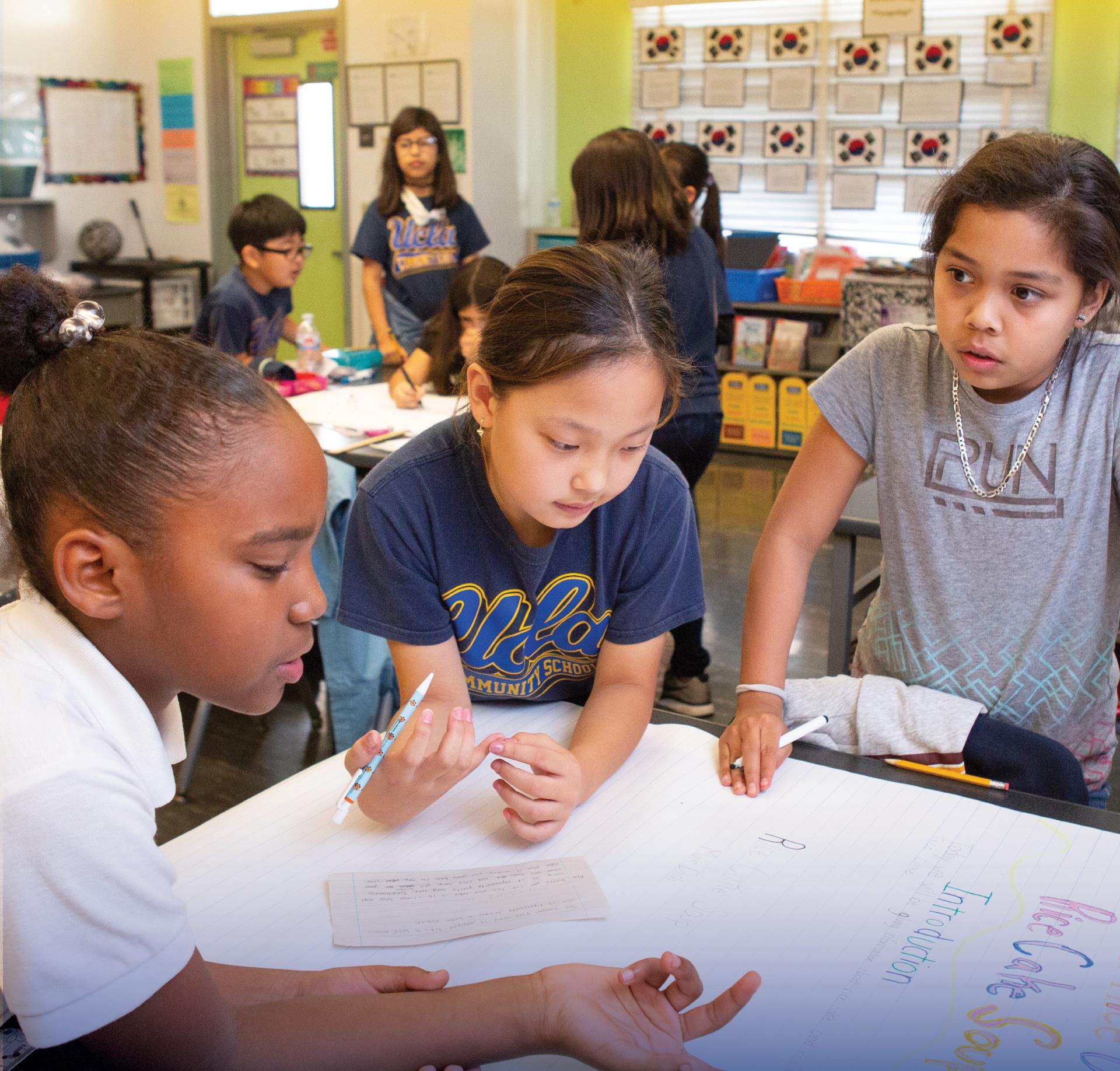 CCSD elementary school students doing schoolwork as a team.