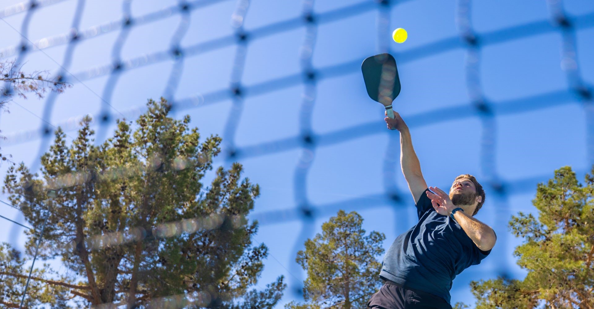 Outdoors Pickleball Court action shot.