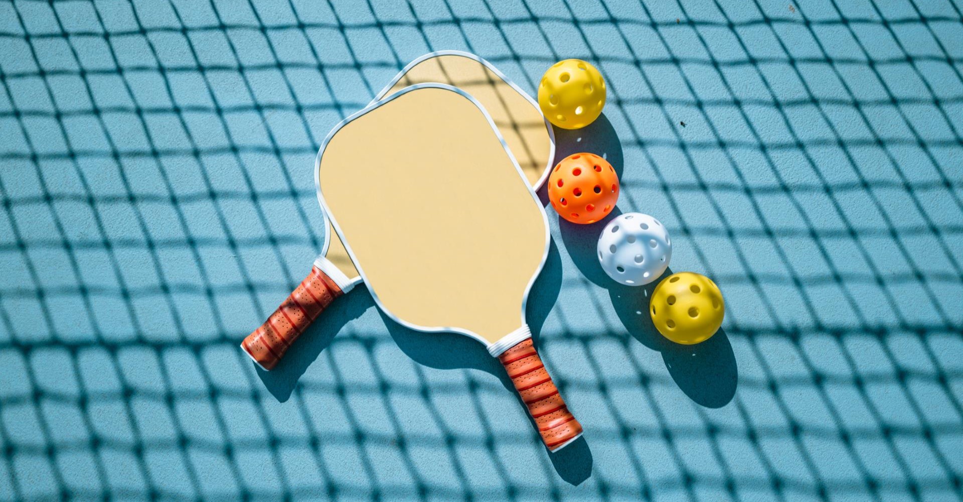 Pickleball paddle and balls.