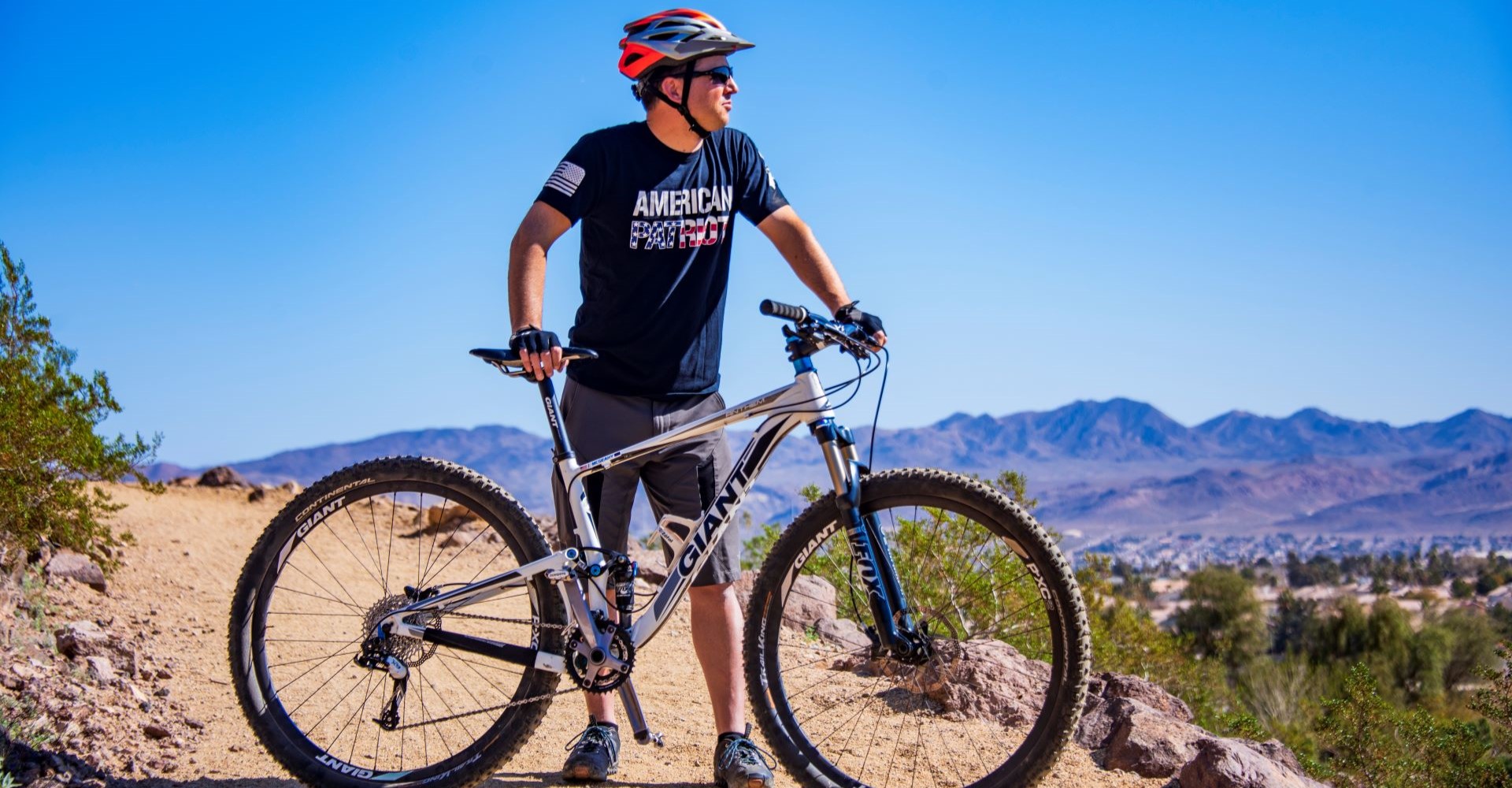 Resident biking on a Henderson trail.