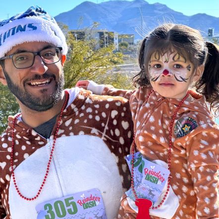 Father and daughter at Reindeer Dash 5k .