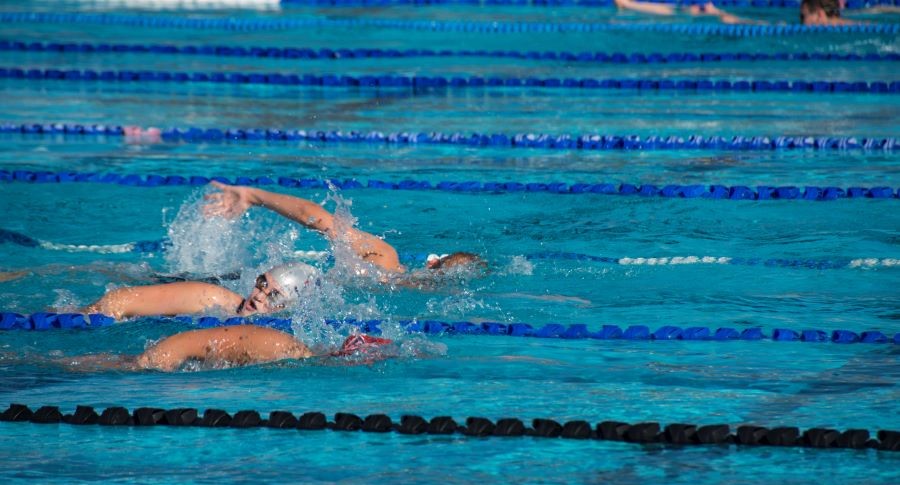 People swimming laps at Heritage Park Aquatic Complex.